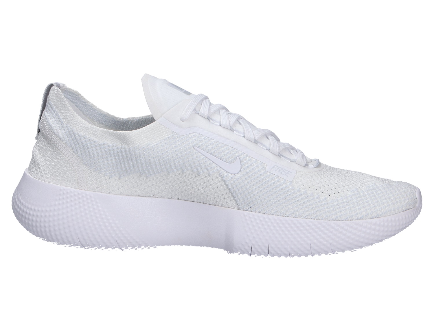 Nike FREE 2025 Laufschuh von der Seite in Weiß mit gestricktem Obermaterial, Schnürung und flexibler Free-Sohle