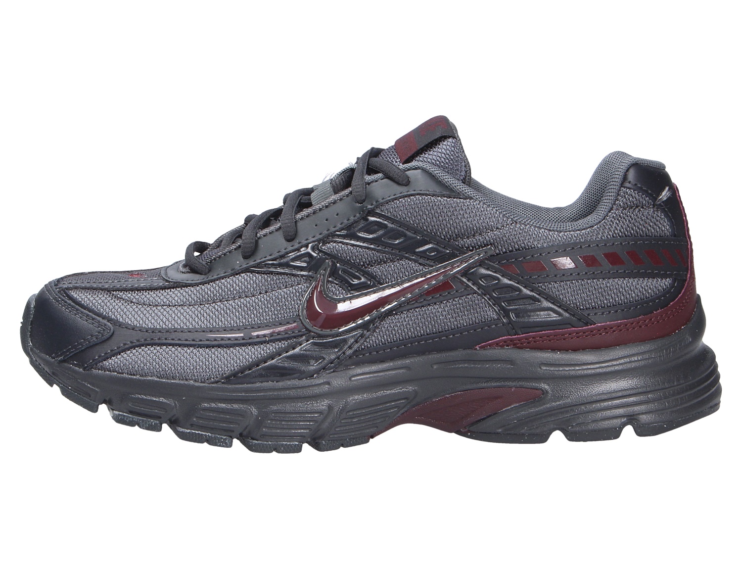 Seitenansicht des Nike Initiator Sneakers in Grau und Schwarz mit bordeauxroten Akzenten und markanter Laufsohle