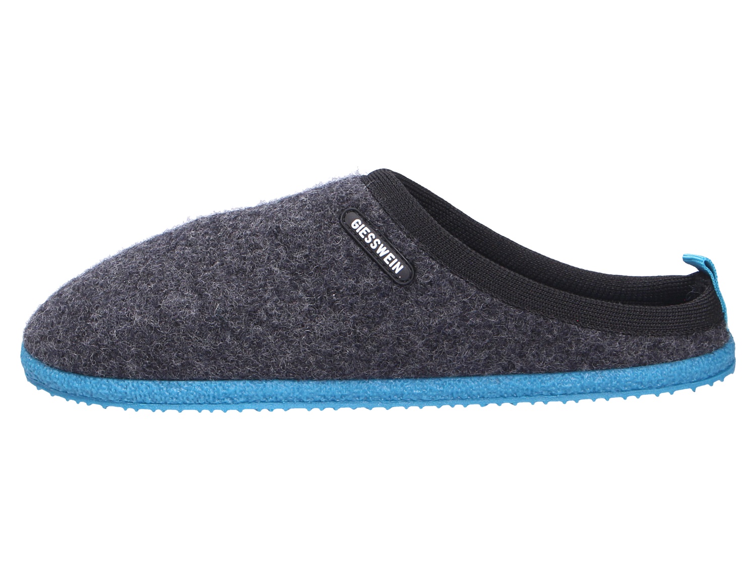 Seitenansicht des Giesswein WOOLPOPS Hausschuhs aus Wolle in Dunkelgrau mit elastischem Einstieg und blauer Sohle